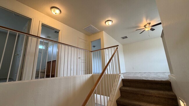 Building Photo - Two Story Home with NEW tile and a large backyard!