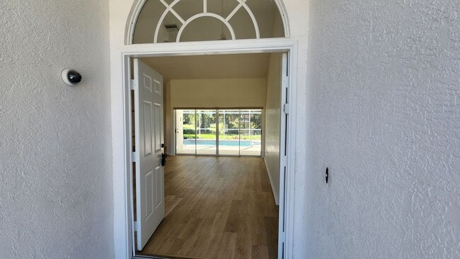 Building Photo - Fresh Paint, New Floors, and a Heated Pool - Move-In Ready!