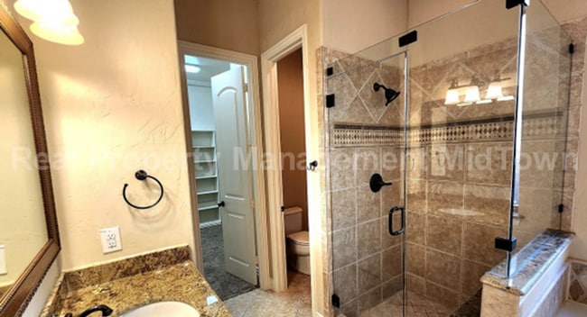 Building Photo - Well-Planned 4BR/3BA—Space for Guests, Off...