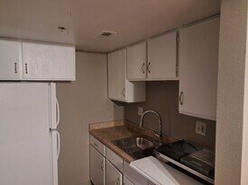 Building Photo - 9220 E Girard Ave