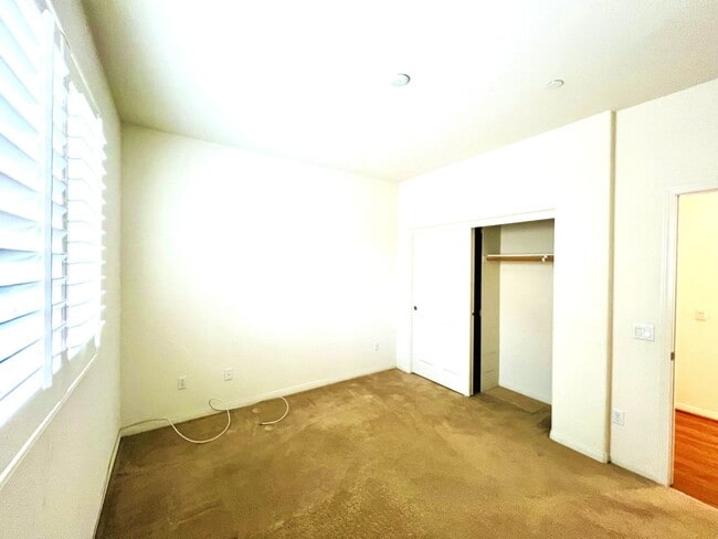 Building Photo - Beautiful 4 Bedroom, 2.5 Baths Single Family Home with 3 Car Tandem Parking Garage and Backyard w...