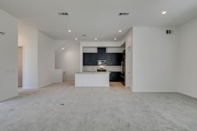Building Photo - Stunning 4-Level Townhome in Inspirada | R...