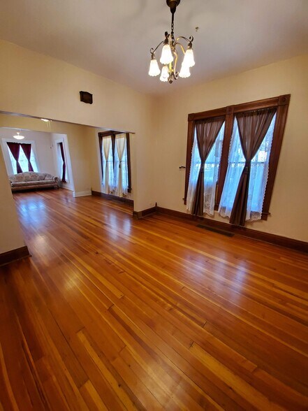 View from built in cabinet near kitchen back toward front door - 607 Harrison Ave