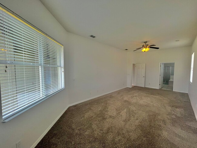 Building Photo - Spacious 4-Bed, 3-Bath Home in Guard-Gated...