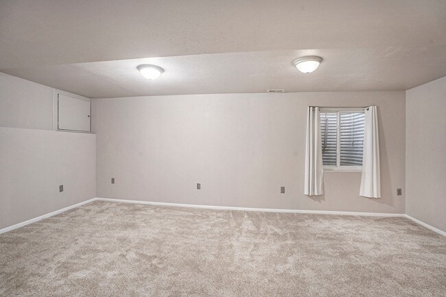 Building Photo - Spacious 4-Bedroom Home in District 20 with Huge Deck & Fenced Yard