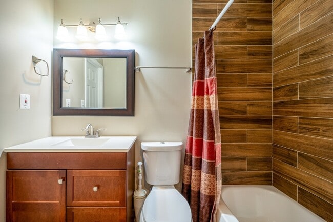 Building Photo - Spacious 3-Level Townhouse with Finished Basement and Fenced Patio