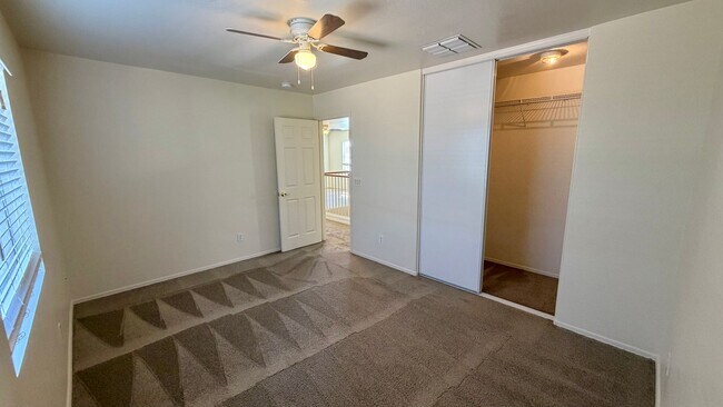 Building Photo - Two Story Home with NEW tile and a large backyard!