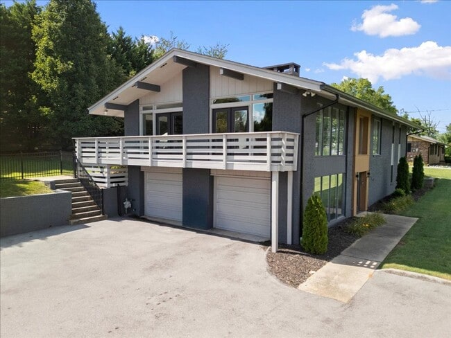 Building Photo - Renovated Mid-Century Modern Home in Belmont West with Finished Basement & Fenced Yard