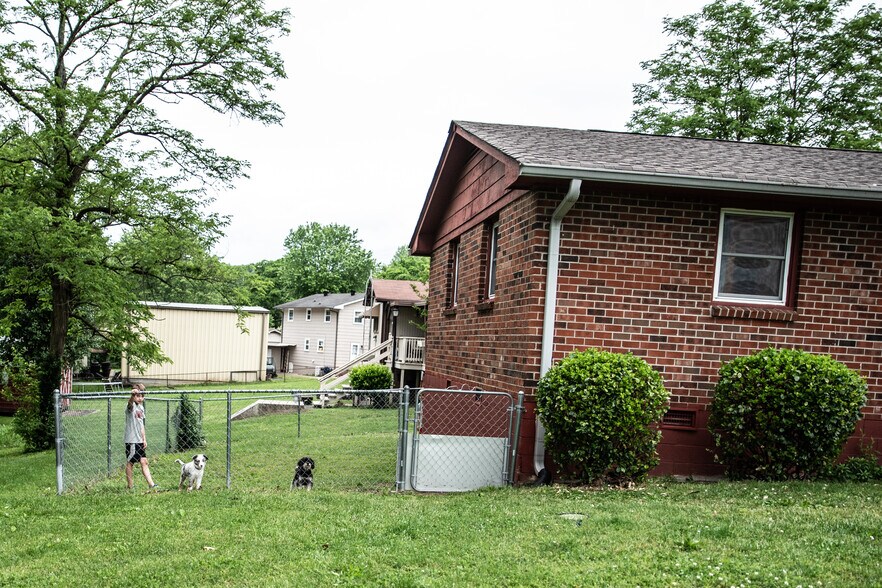 Fenced in yard. - 101 Evergreen Circle