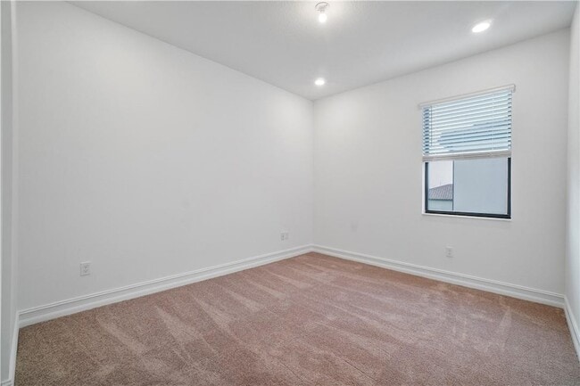 Building Photo - 8755 Grand Prix Ln