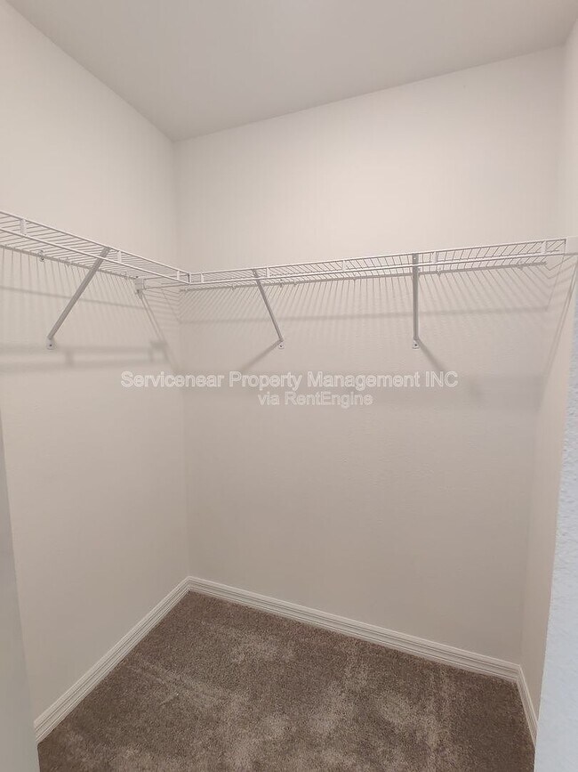 Building Photo - 7412 French Marigold Ave.