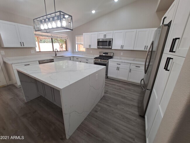 Building Photo - 9074 E Caribbean Ln