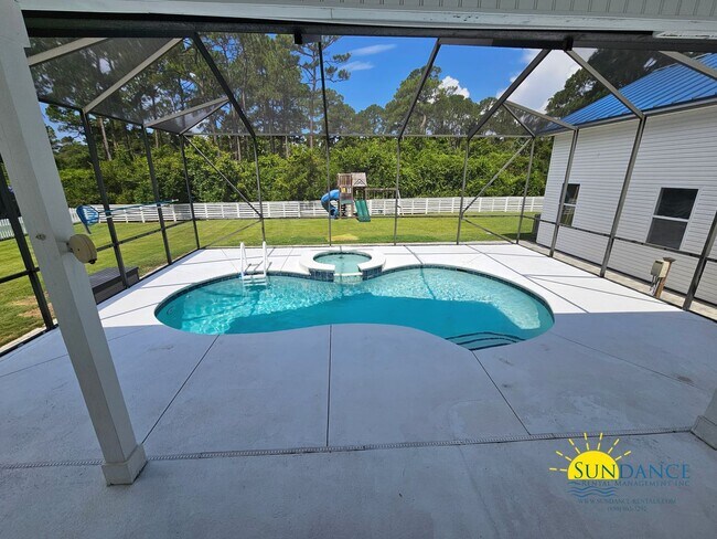 Building Photo - Rare Double Lot in Sea Dunes with Pool & Detached Carriage House!
