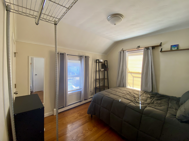 Bedroom 2 with closet and clothing rack - 4 Pond St