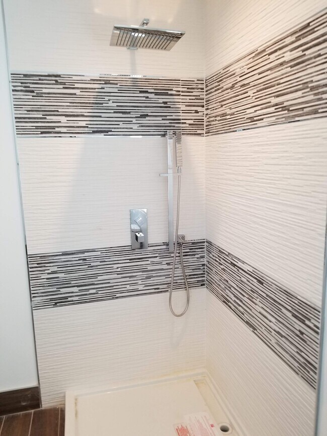custom shower - 10880 National Blvd