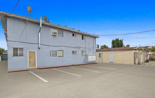 Building Photo - 6211 10th Ave