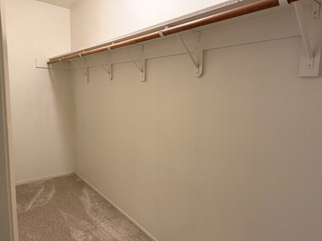 Building Photo - Three bedroom two and a half bath Condo