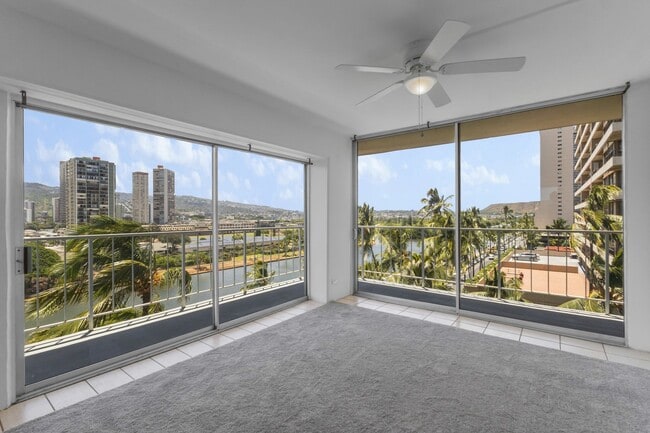 Building Photo - Waikiki 1BR/1BA with Ala Wai Canal & Mountain Views — Wraparound Lanai, Utilities Included