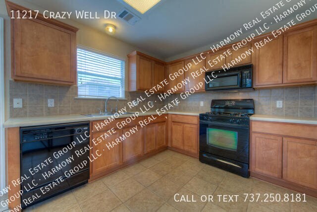Building Photo - 11217 Crazy Well Dr