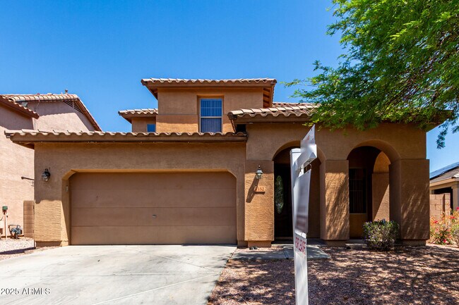 Building Photo - 7352 W Valencia Dr