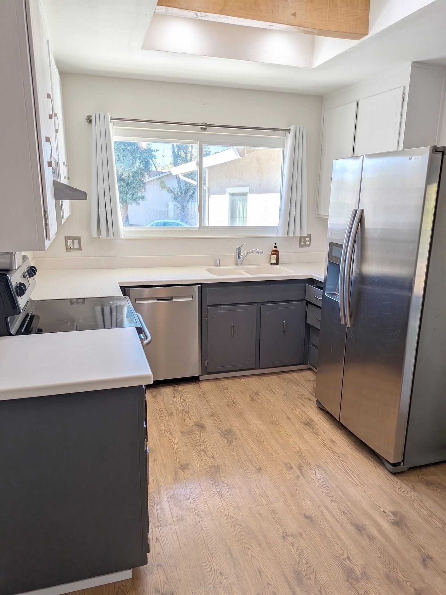 Kitchen with refrigerator, water and ice maker. - 3006 Campbell Pl