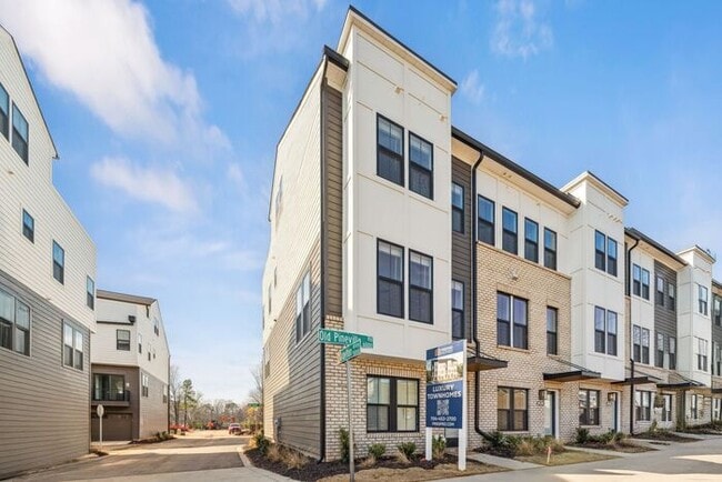 Building Photo - High-End 2BR Townhome | Rooftop Terrace + 2-Car Garage | 24-Unit Community