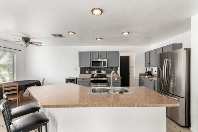 Building Photo - 8812 N 67th Dr