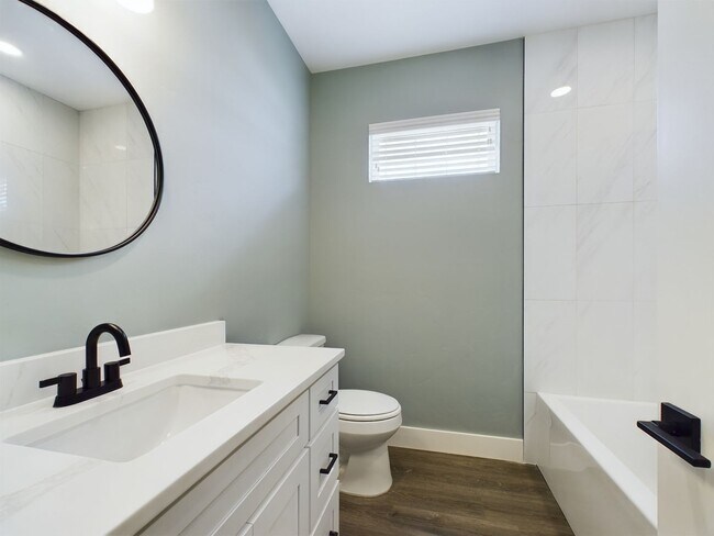 Building Photo - Charming 3-Bedroom Home with Updated Kitchen and Dual-Sink Primary Bath