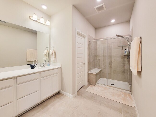 Building Photo - A true gem on a quiet corner lot, this spacious and sun-filled home is tucked away from street no...