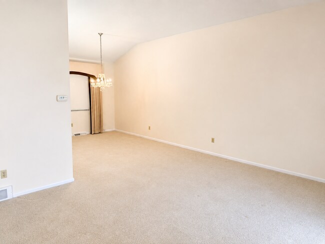 Building Photo - Spacious 3-Bedroom Split-Level with Formal Dining Room, Fireplace, and Fenced Backyard