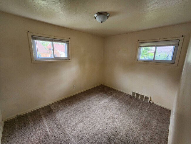 Building Photo - Move-In Special: Save $300 on This Charmin...