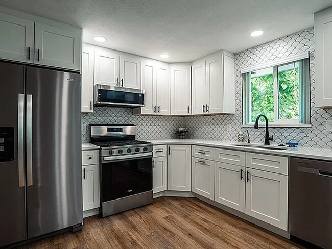 Building Photo - Remodeled 3 bedroom, 3 bath home with additional non-conforming bedroom in basement