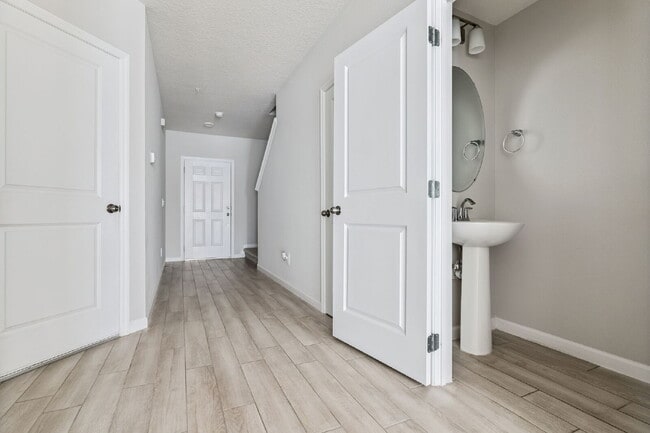 Building Photo - Stunning 3 bedroom, 2.5 bathroom townhome located in a highly desirable gated community