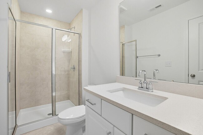 Building Photo - Brand-new three-story townhome in the Univ...
