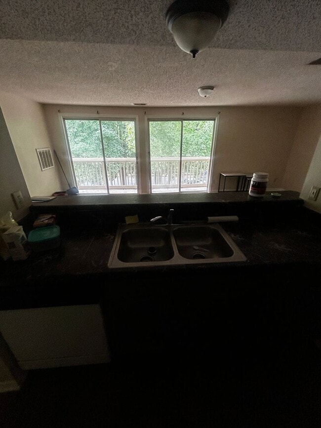 Building Photo - Freshly Renovated 3BR Condo Steps from UNC...