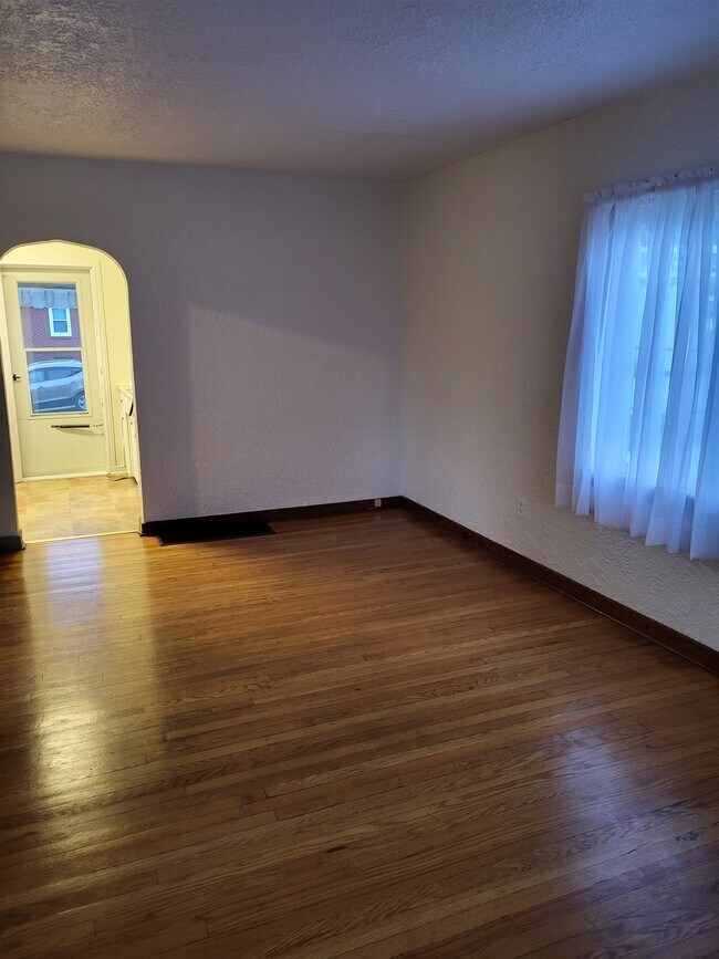 Family Room -newly painted (brighter than appears) - 339 Arch Ave