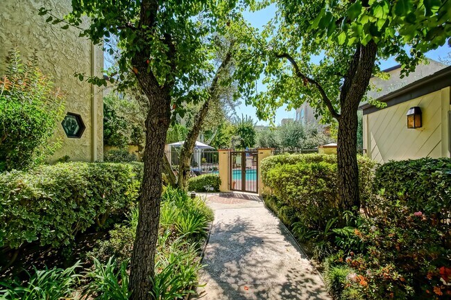 Building Photo - BRIGHT & AIRY, REAR-UNIT TOWNHOUSE W/ SPACIOUS PATIO, BALCONY & HUGE 2-CAR GARAGE IN GATED COMMUN...