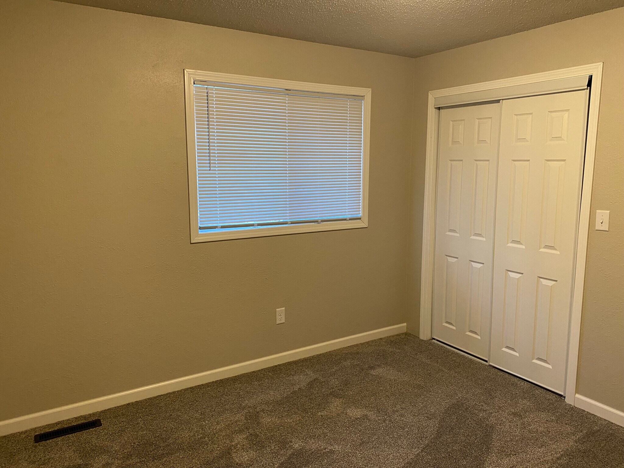 Upstairs bedroom has new carpet! - 225 6th St SE