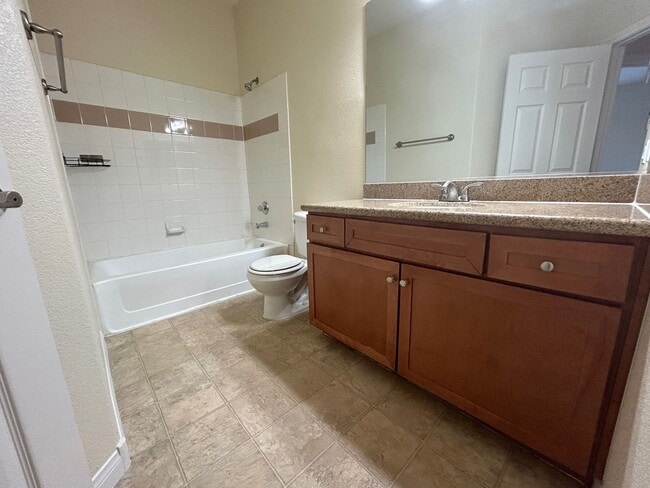 Building Photo - ADORABLE 2 BEDROOM 2 BATHROOM CONDO LOCATED IN A GATED COMMUNITY