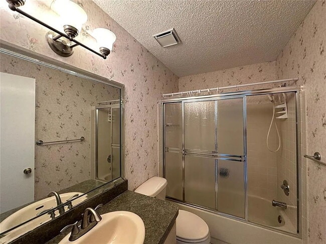 Building Photo - Adorable 2/2 villa in active 55+ community.