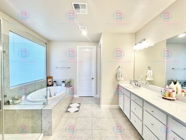 Building Photo - Welcome to your dream home, where modern elegance meets unparalleled convenience!