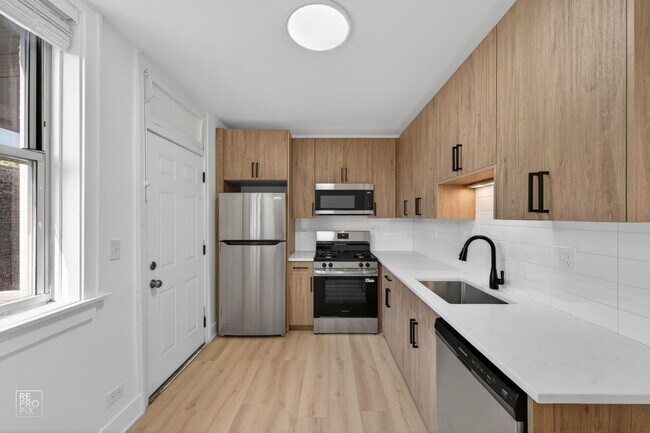 Building Photo - 6312 N Artesian Ave
