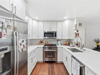 Building Photo - Newly Renovated 2BD Condo in Gated Community Now Available!