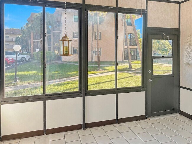 Building Photo - 6090 N Sabal Palm Blvd