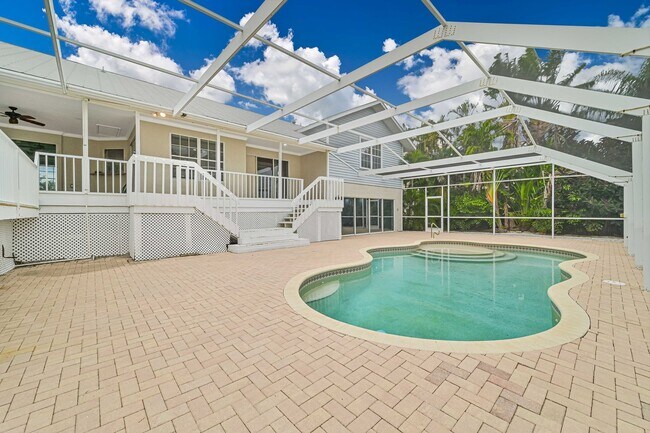 Building Photo - **Direct Gulf Access Pool Home! 4 BED/3 BA...