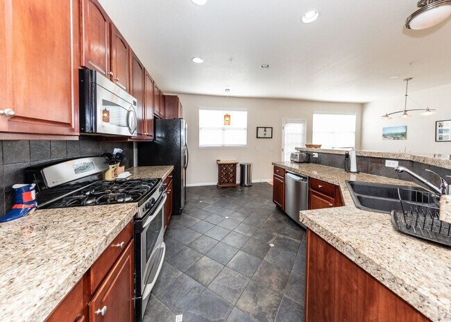 Building Photo - Downtown 3 Bedroom Townhome with 2 Car Garage