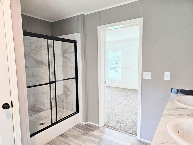 Building Photo - Welcome Home! Spacious 3-Bed, 2-Bath Split Floor Plan on ¾ Acre Lot