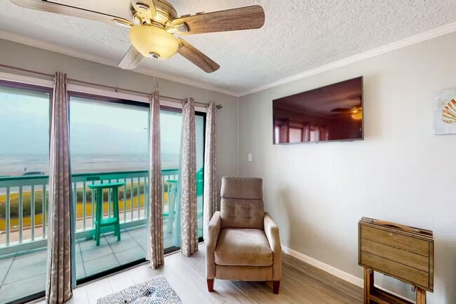 Ocean front living room view /w patio - 6102 Seawall Blvd