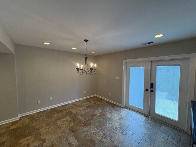 Building Photo - Four Bedroom Townhome Available Now