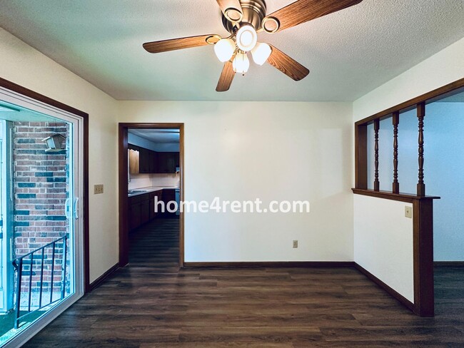 Building Photo - Charming Duplex Style Home with New Paint, Updated Floors, Finished Basement and a Quiet Back Patio!